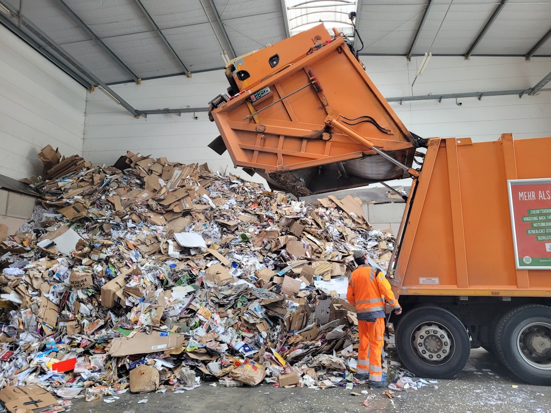 our-story Orange worker in a German landfill, Germany